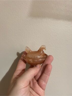 Mini peach slag hen on a neat Decorative Glass Chicken - Swirled Amber